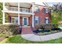Beautiful brick home with a covered porch and well-maintained landscaping in a lovely neighborhood at 1105 Hoyle Ln, Waxhaw, NC 28173