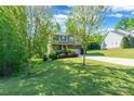 Well-manicured lawn surrounds this two story home, creating a welcoming and picturesque setting at 2202 Chickasaw Loop, Rock Hill, SC 29732
