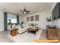 Bright living room with a plush sofa, stylish coffee table, and contemporary decor at 6455 Honor Ave, Midland, NC 28107