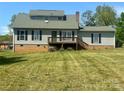 Charming home with a deck and a spacious backyard, perfect for outdoor entertaining at 109 Terrace Pl, Lincolnton, NC 28092