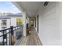 Spacious outdoor deck/balcony with views of the exterior, perfect for relaxing or entertaining guests at 17810 Half Moon Ln # L, Cornelius, NC 28031