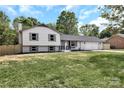 Charming two-story home features a large yard, attached garage and neutral colors at 205 Mcgregor Rd, Gastonia, NC 28056