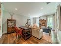 Cozy sitting room with ample natural light, showcasing a blend of classic and contemporary decor, and a relaxing ambiance at 242 Beckham Ct, Charlotte, NC 28211
