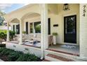 Inviting covered front porch with comfortable seating and stylish decor at 754 Wriston Pl, Charlotte, NC 28209
