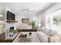 Bright living room with fireplace, modern decor, and ample natural light at 754 Wriston Pl, Charlotte, NC 28209