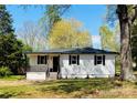 Charming home with a well-maintained lawn and inviting front porch at 188 Bailey Rd, Mooresville, NC 28117
