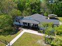 Spacious backyard and mature trees surround this beautifully maintained home, offering privacy and space at 502 Hyde St, Kannapolis, NC 28083