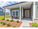 Inviting porch with seating area, perfect for enjoying the outdoors at 510 Black Bear St # 145P, China Grove, NC 28023