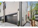 A modern home with a spacious garage and clean exterior lines at 1115 Greenleaf Ave # B, Charlotte, NC 28202
