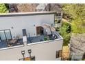 Relaxing rooftop deck with outdoor seating, umbrella, and views at 1115 Greenleaf Ave # B, Charlotte, NC 28202