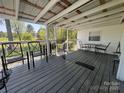 Relaxing covered porch with seating area, perfect for enjoying the outdoors at 143 Ezra Rd, Kings Mountain, NC 28086
