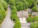 Aerial view of the home, illustrating its location, landscaping, and proximity to the surrounding neighborhood at 3004 Village Ridge Dr, Gastonia, NC 28056