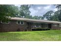 Inviting brick home with a well-manicured lawn and a welcoming front porch, ideal for curb appeal at 3378 Tanglewood Dr, Rock Hill, SC 29732