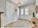 Inviting foyer with stylish lighting, elegant rug, and decorative wall accents sets a sophisticated tone at 349 Miners Cove Way, Fort Mill, SC 29708