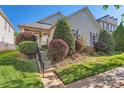 Attractive home featuring well-maintained landscaping and a welcoming entrance at 3939 Archer Notch Ln, Huntersville, NC 28078