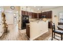 Spacious kitchen with dark cabinetry, granite countertops, and stainless steel appliances at 3939 Archer Notch Ln, Huntersville, NC 28078