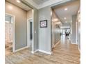 Neutral colored hallway that connects to the bathroom and living areas at 4083 Home Grown Way, Clover, SC 29710