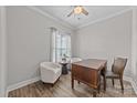Bright office space with hardwood floors, neutral walls, and a traditional wooden desk at 1050 Coppergate Dr, Salisbury, NC 28147