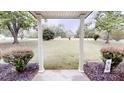 Picturesque view from the porch with decorative shrubs and landscape at 3816 Redman Rd, Shelby, NC 28150