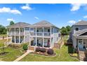 Two-story home with double porches and well-manicured lawn in a friendly neighborhood at 507 E Main St, Rock Hill, SC 29730