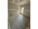 Spacious bedroom features fresh drywall, window, and closet with room for personalization at 15700 Stokes Ferry Rd, Richfield, NC 28137
