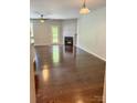 Spacious living room features hardwood floors and fireplace at 2752 Sawbridge Ln, Gastonia, NC 28056