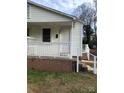 Inviting exterior of a charming home, showcasing a cozy front porch at 424 Skyland Ave, Charlotte, NC 28205