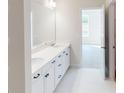 Bright bathroom with a double vanity, modern fixtures, and a clean, minimalist design at 604 Banter Ln # 29, Cramerton, NC 28032