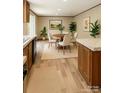 Eat-in dining area with wood table, chairs, and natural light at 850 Deep Hollow Ct, Clover, SC 29710