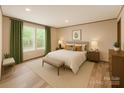 Comfortable main bedroom featuring bright natural light and neutral decor and carpet at 850 Deep Hollow Ct, Clover, SC 29710