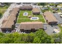 Aerial view of apartments highlighting the community pool, green space, and on-site parking at 123 Carriage House Dr, Kannapolis, NC 28081