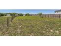 Large fenced-in backyard offers ample space for recreation and outdoor activities at 2206 Mills Harris Rd, Wingate, NC 28174