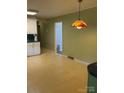 Eat-in kitchen features decorative lighting, and ample space at 918 Carmel Dr, Gastonia, NC 28056