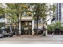 Street view of hotel residences showing the main entrance and a canopy in an urban setting at 127 N Tryon St # 511, Charlotte, NC 28202
