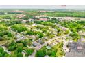 Aerial shot showcasing the neighborhood and community amenities near the property, including river access at 704 E Catawba St, Belmont, NC 28012