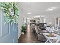 Spacious living room with hardwood floors, an open floor plan, and modern decor, creating a welcoming atmosphere at 1062 River Haven Sw Ave, Concord, NC 28025