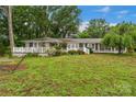 Charming home featuring a spacious porch and a well-manicured lawn perfect for relaxation and outdoor enjoyment at 1607 Old Lawyers Rd, Marshville, NC 28103
