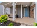 Welcoming front porch with seating, decorative accents, and a charming entrance at 190 Tetcott St, Mooresville, NC 28115