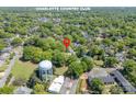 Aerial shot of a neighborhood near Charlotte Country Club, featuring mature trees and charming homes at 1917 Marguerite Ave, Charlotte, NC 28205
