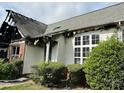 Extensively damaged one-story home after a fire, with visible structural damage at 3205 Creek Trail Rd, Indian Trail, NC 28079