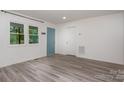 Open concept living room with clean modern floors and neutral colors at 500 3Rd St, Stanley, NC 28164