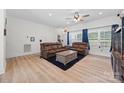 Spacious living room with neutral walls, wood-look floors, and comfortable seating at 1009 Rainbow Cir, Catawba, SC 29704