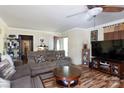 Bright living room featuring comfortable seating, wood flooring, and a welcoming atmosphere at 3842 Harmony Rd, Catawba, SC 29704
