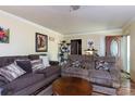 Cozy living room showcasing plush sofas, round coffee table, and ample natural light at 3842 Harmony Rd, Catawba, SC 29704