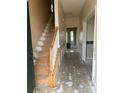View of the entryway with stairs and hallway leading to the house at 7505 Conifer Cir, Indian Trail, NC 28079