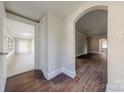 Entryway features hardwood floors, neutral walls, and archway leading to the rest of the home at 8 Bolt Dr, Shelby, NC 28150