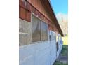 Close-up exterior features wood and white siding, showing window, door, and visible 'For Sale' sign at 908 E 1St St, Newton, NC 28658