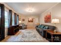 Comfortable living room with large windows and neutral paint, creating a warm and inviting space at 910 Surry Dr, Shelby, NC 28152