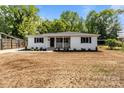 Charming home with fresh landscaping and inviting porch perfect for curb appeal and outdoor enjoyment at 1306 Klondale Ave, Kannapolis, NC 28081
