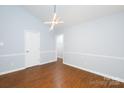 Spacious room featuring modern lighting, perfect for entertaining guests at 1455 Fieldcrest Cir, Rock Hill, SC 29732
